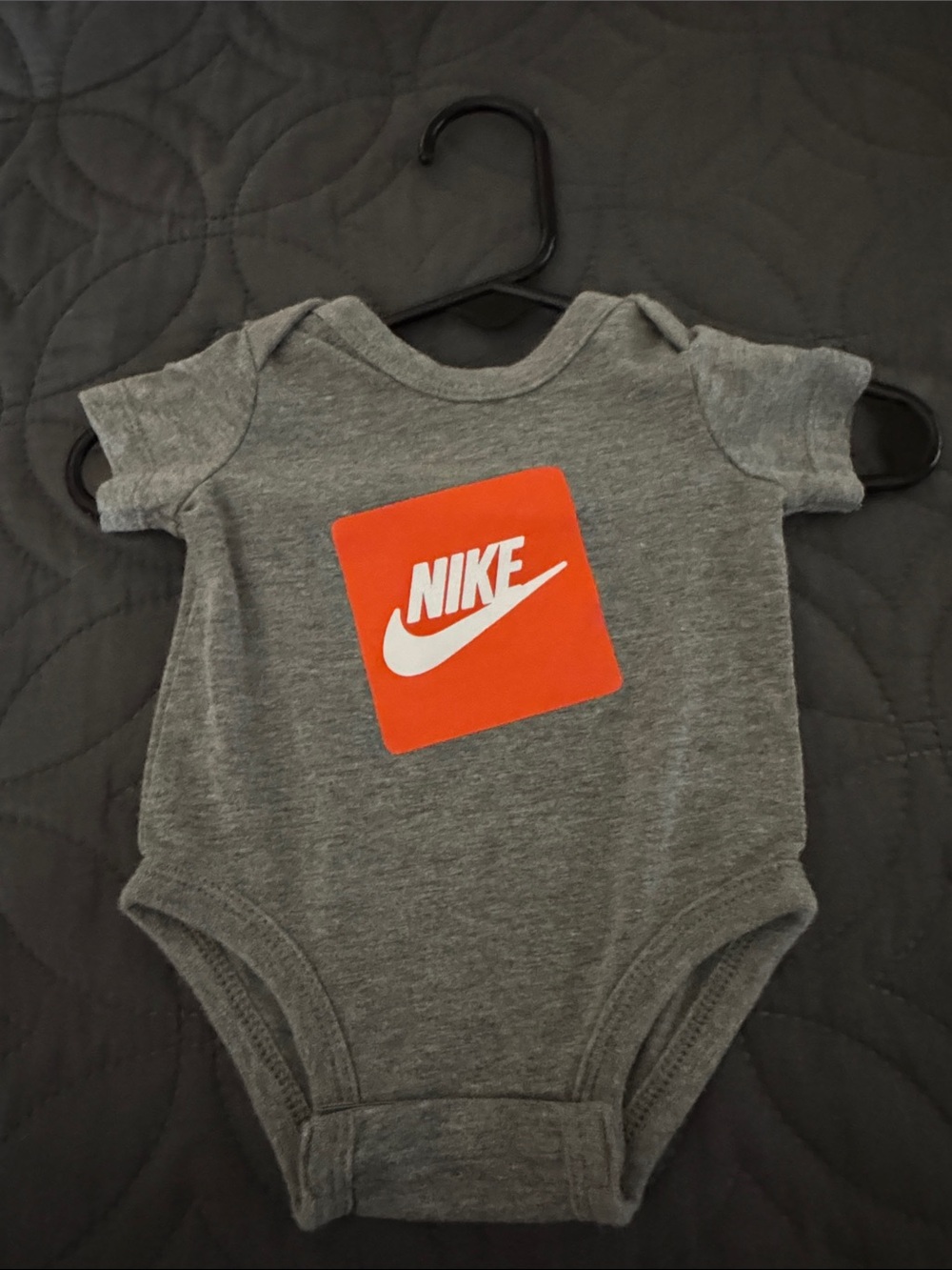 Nike Gray One-Piece Bodysuit with Orange Logo